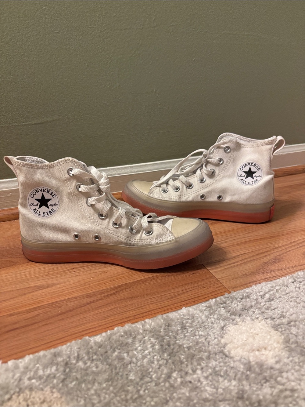 Converse White High Top Sneakers with Orange-Tinted Sole